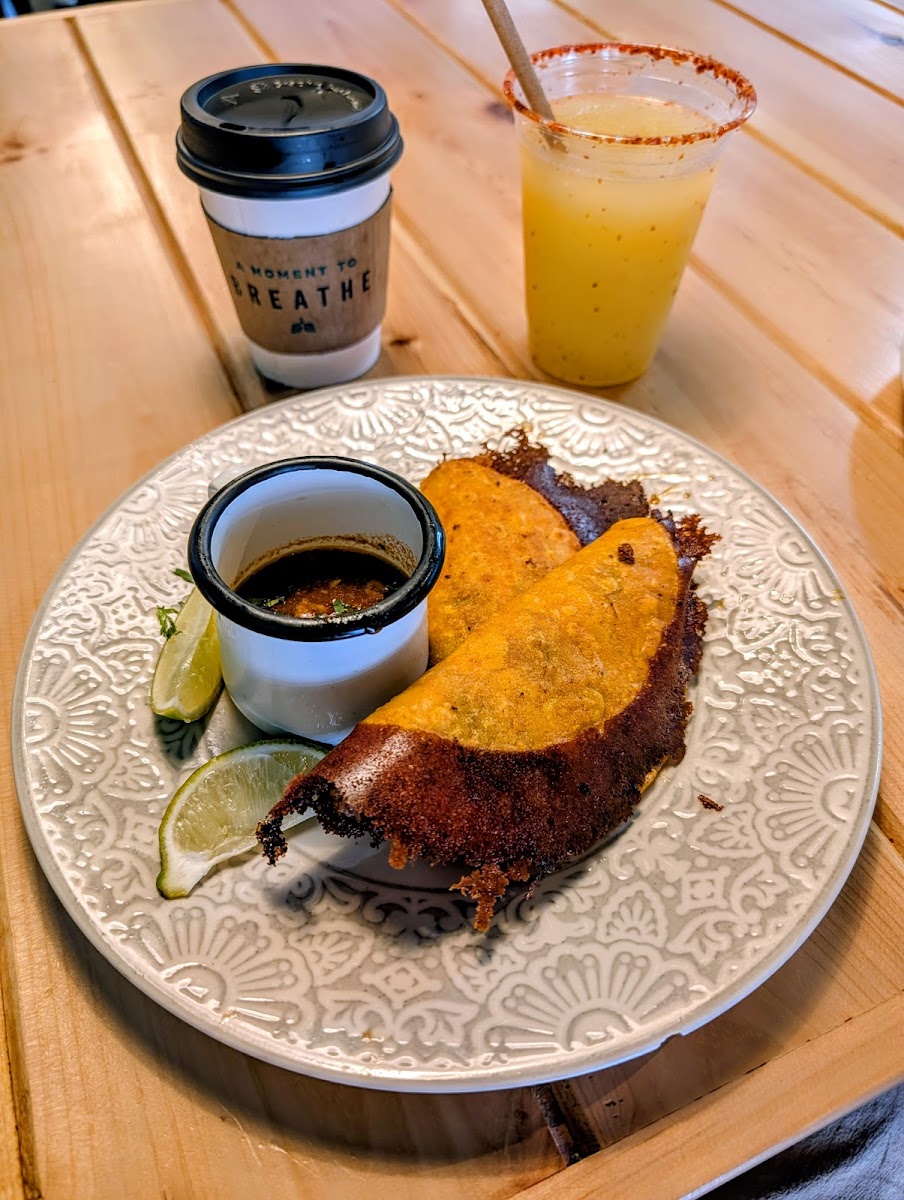 Tacos with drinks on table